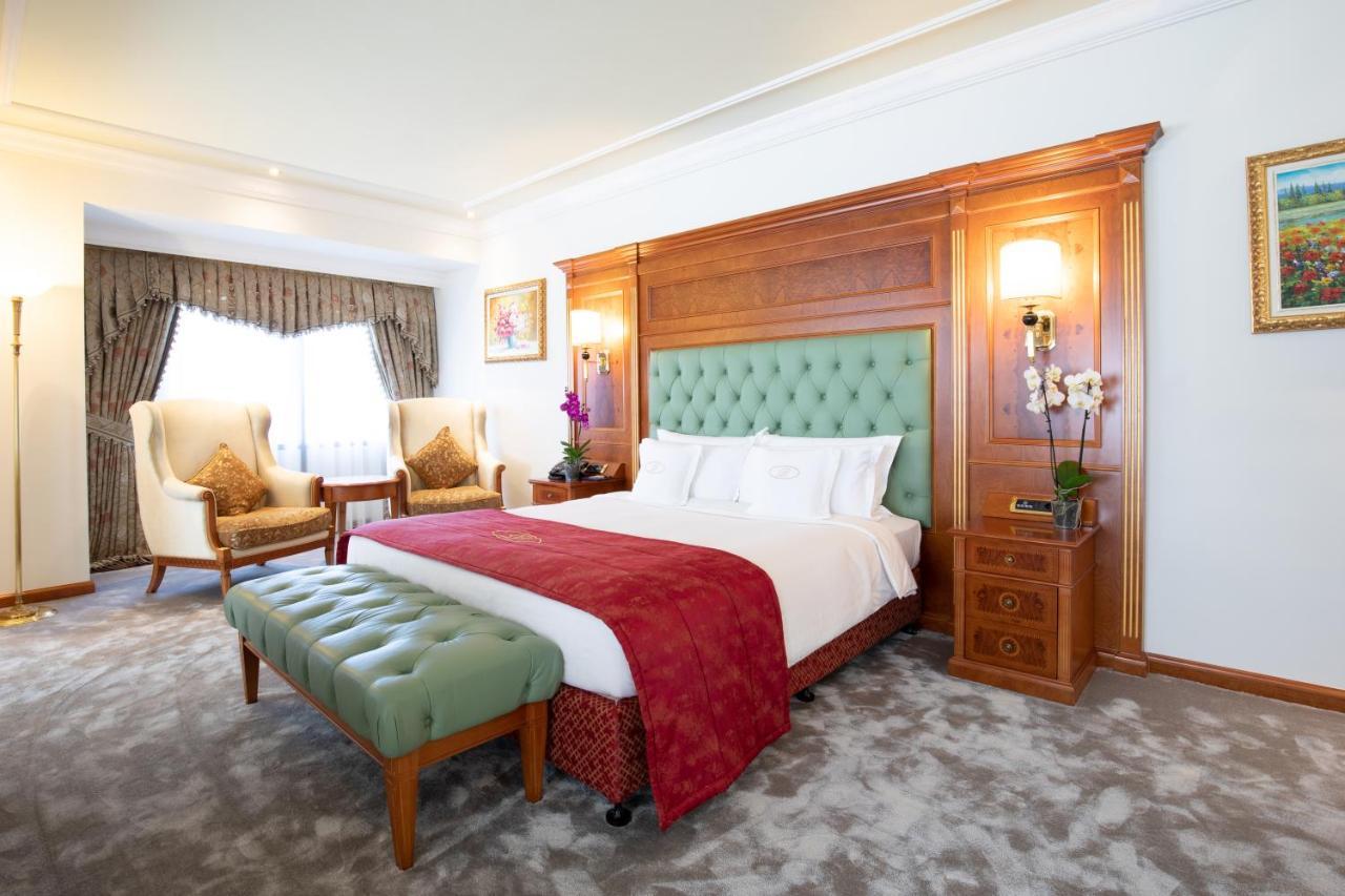 スイス ダイヤモンド ホテル プリシュティナ エクステリア 写真 A bedroom at the hotel